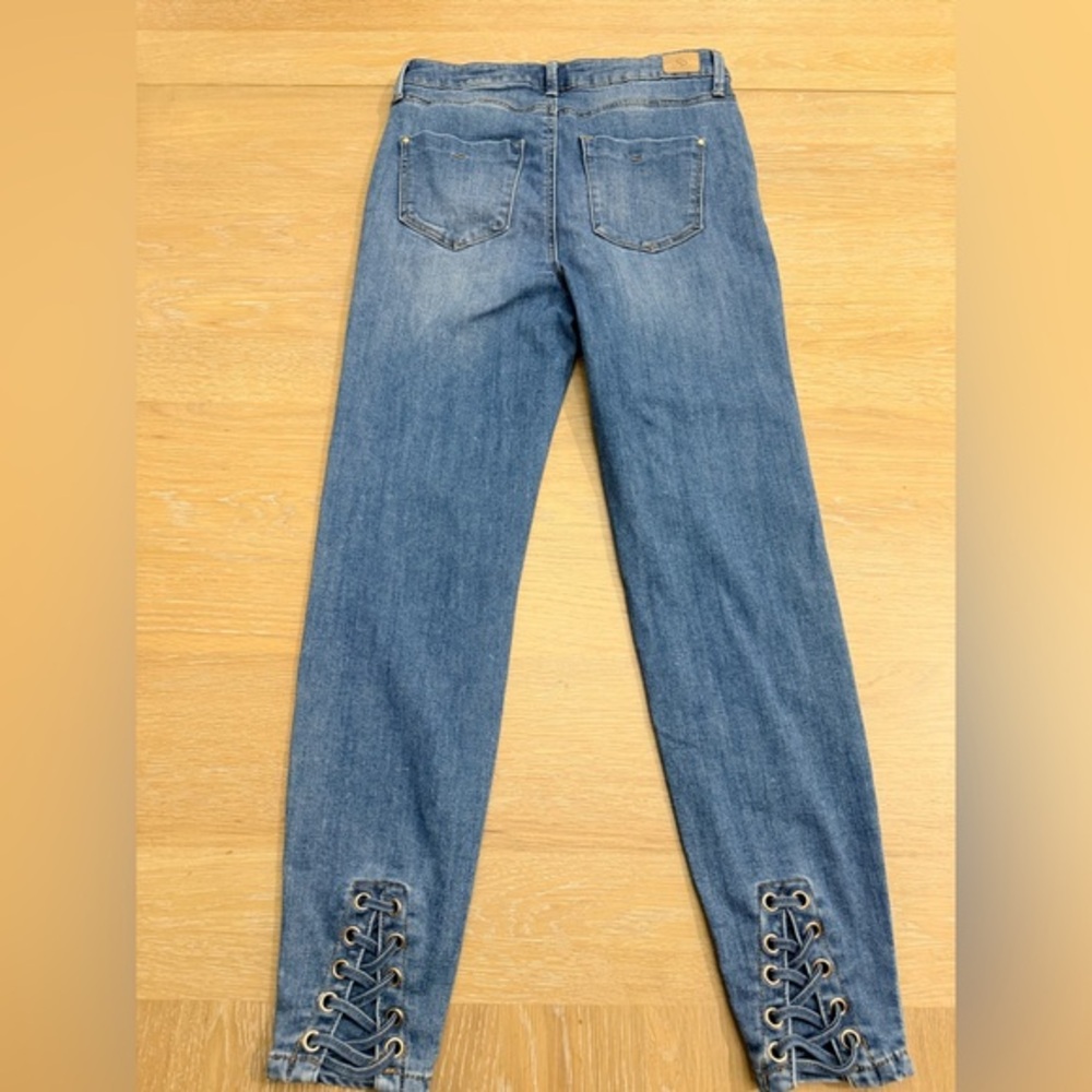 Celebrity Pink Lace-Up Hem Skinny Jeans in Blue